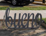 Artistic bike rack spelling out Be Mucho Bueno