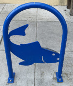 Blue bike rack in the shape of a fish
