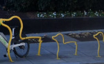 Yellow duck and ducklings bike racks