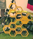 Decorative yellow honeycomb beehive bike racks by Bitter and Twisted Cocktail