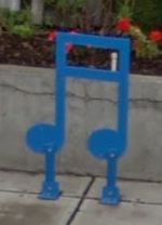 Blue musical notes bike racks on Front St.
