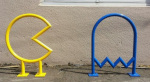 Pac Man bike racks in front of The Coin Jam