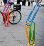 Bike racks shaped like colorful stacked paperclips